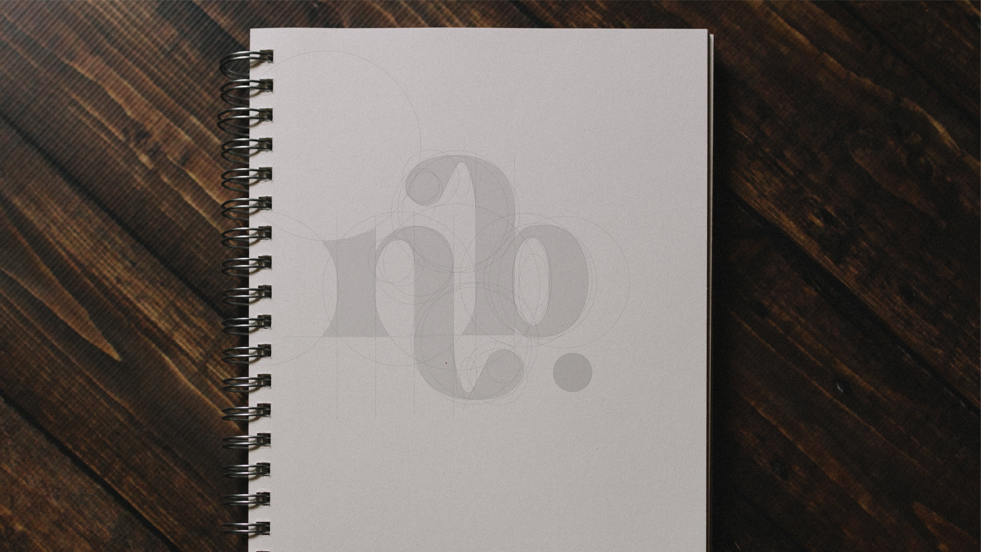 Boceto constructivo del logotipo NB